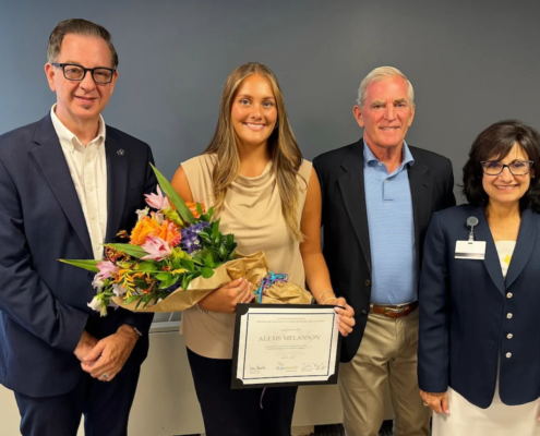 From Left: Dean Danny Willis, Hope Melanson, Flynn Foundation founder and President Fred Flynn, and HopeHealth President and CEO Diana Franchitto