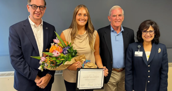 From Left: Dean Danny Willis, Hope Melanson, Flynn Foundation founder and President Fred Flynn, and HopeHealth President and CEO Diana Franchitto